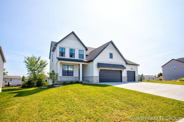 modern farmhouse style home featuring a garage, brick siding, concrete driveway, board and batten siding, and a front yard