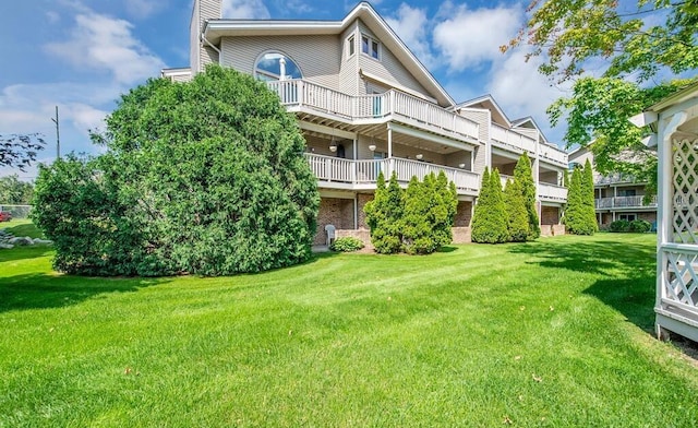 21082 Boulder Cir, Northville, MI 48167 - back of property featuring a chimney and a yard