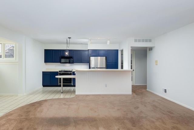 21082 Boulder Cir, Northville, MI 48167 - kitchen with freestanding refrigerator, black microwave, range, visible vents, and blue cabinetry