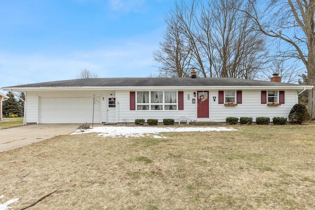 single story home featuring a garage, a chimney, a front lawn, and concrete driveway