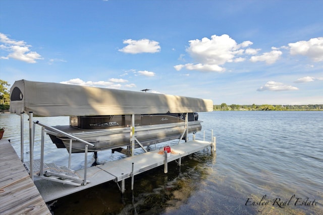 view of dock with a water view and boat lift