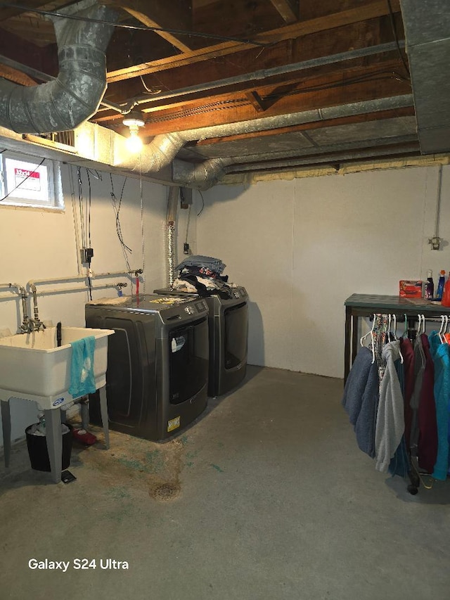 below grade area featuring independent washer and dryer