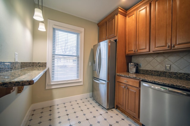 kitchen featuring stainless steel appliances, ornamental molding, backsplash, and brown cabinets