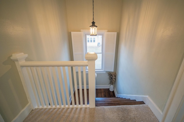 stairs with baseboards