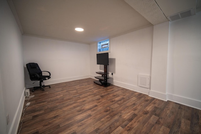 interior space featuring dark wood finished floors, visible vents, and baseboards