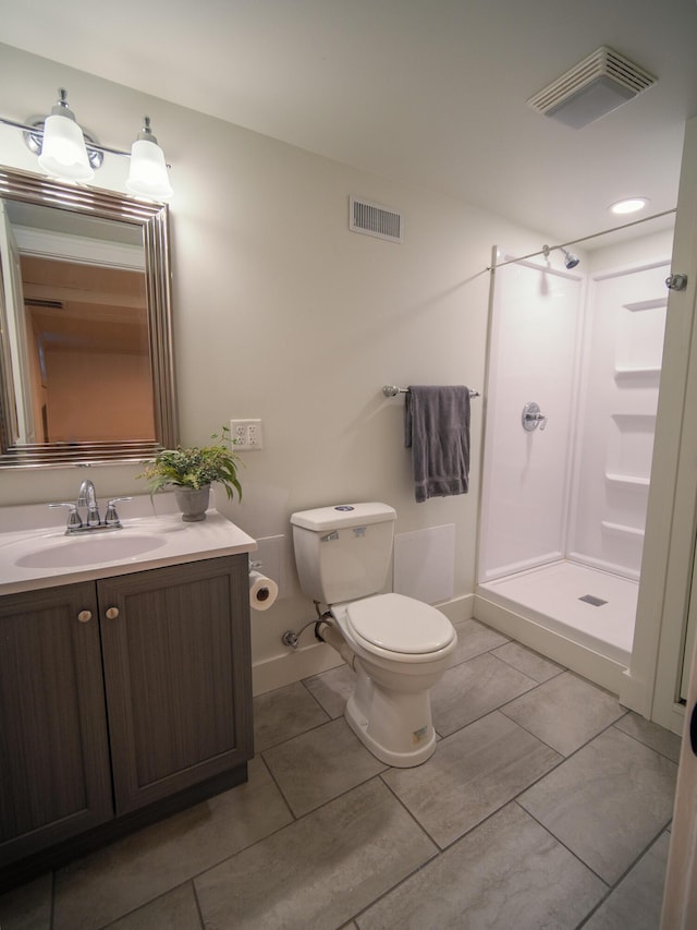 full bath featuring visible vents, a shower stall, toilet, and vanity