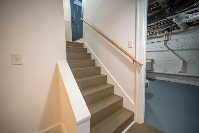 stairway with finished concrete floors