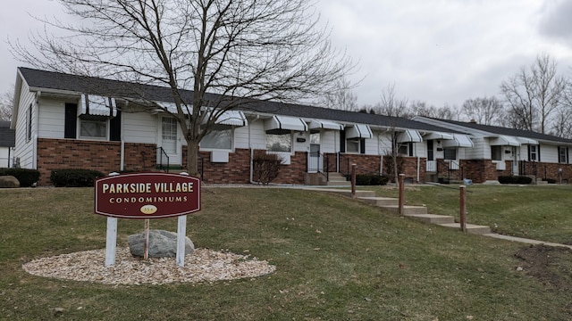 view of community with a yard