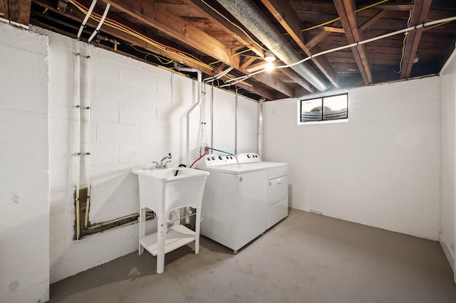 clothes washing area with laundry area and separate washer and dryer