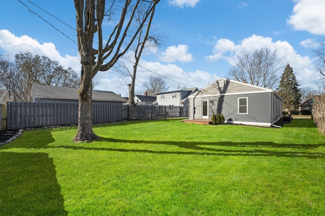 view of yard with a fenced backyard