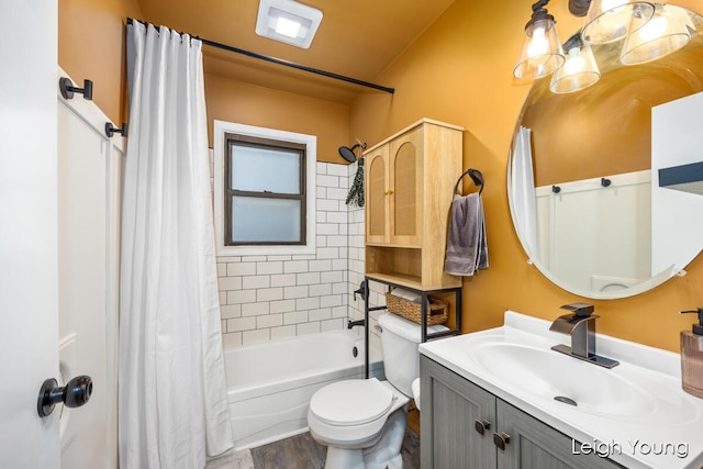 full bathroom with vanity, toilet, wood finished floors, and shower / tub combo with curtain