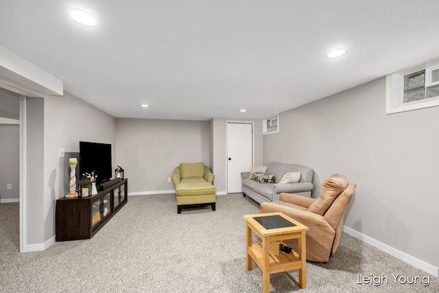 living room featuring recessed lighting, baseboards, and carpet floors