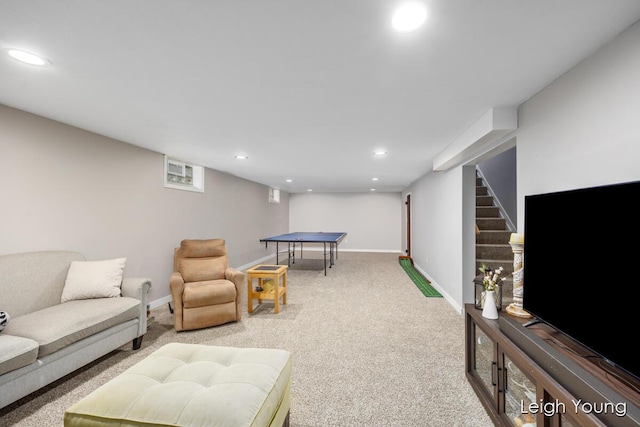 living room featuring carpet flooring, recessed lighting, and baseboards