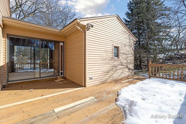 view of snow covered deck