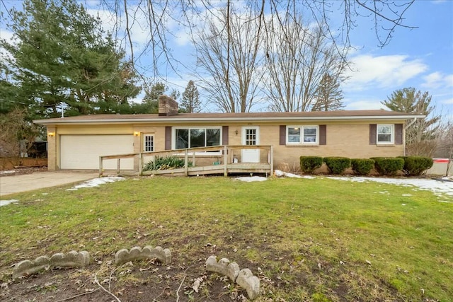 ranch-style home featuring driveway, an attached garage, a chimney, and a front lawn