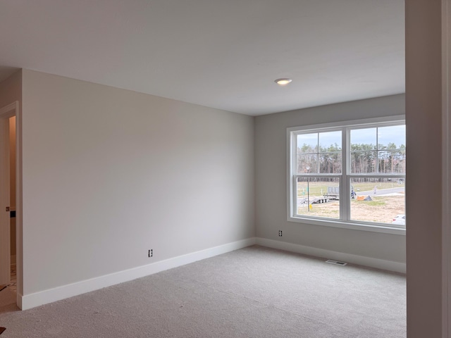 10712 Melanie Dr, Allendale, MI 49401 - unfurnished room featuring baseboards, carpet flooring, recessed lighting, and visible vents