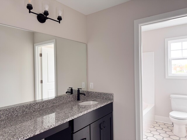 10712 Melanie Dr, Allendale, MI 49401 - full bathroom with tile patterned flooring, a shower, vanity, toilet, and a tub to relax in