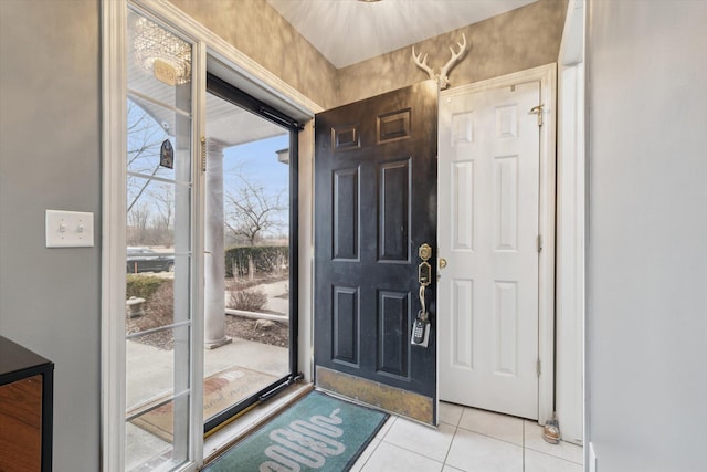 entrance foyer with light tile patterned floors