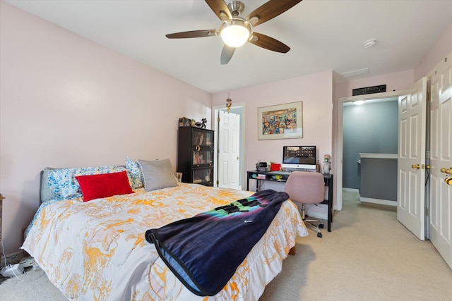 bedroom featuring carpet, a ceiling fan, and baseboards