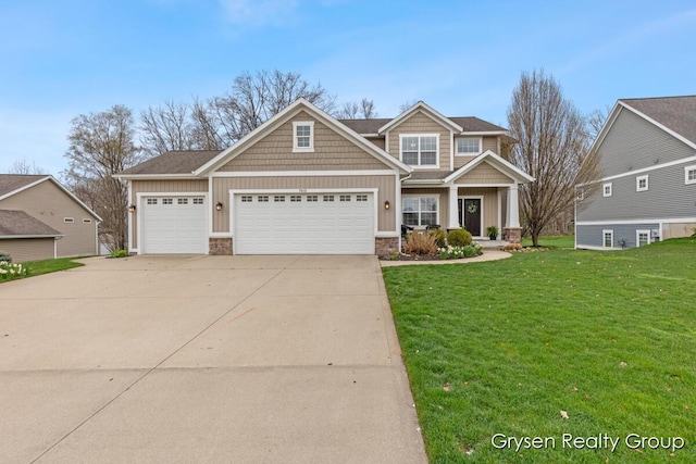 7313 Valhalla Dr, Hudsonville, MI 49426 - craftsman inspired home with concrete driveway, stone siding, and board and batten siding