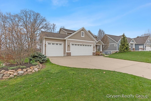7313 Valhalla Dr, Hudsonville, MI 49426 - craftsman-style house featuring a front lawn, driveway, stone siding, and an attached garage