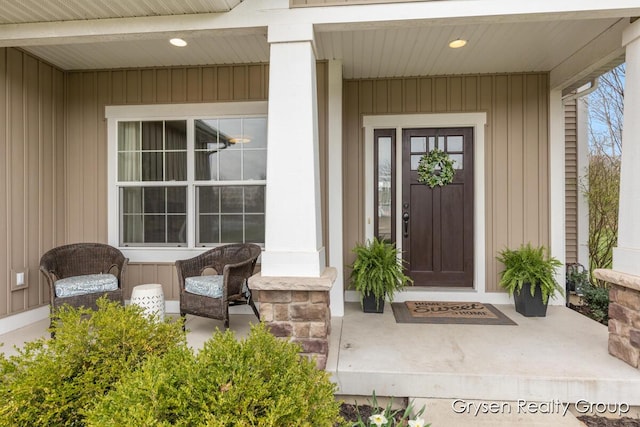 7313 Valhalla Dr, Hudsonville, MI 49426 - doorway to property featuring a porch