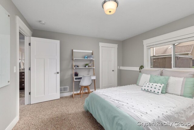 7313 Valhalla Dr, Hudsonville, MI 49426 - carpeted bedroom featuring visible vents and baseboards