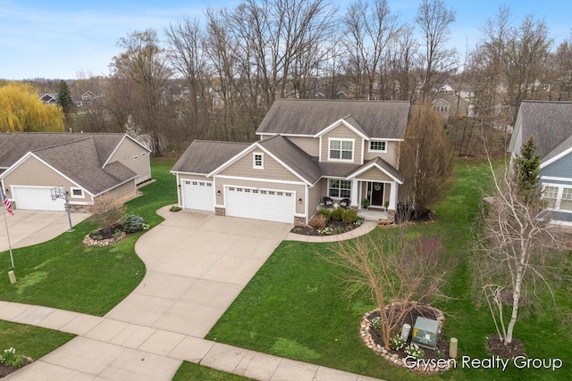 7313 Valhalla Dr, Hudsonville, MI 49426 - craftsman inspired home with a porch, a garage, driveway, stone siding, and a front lawn