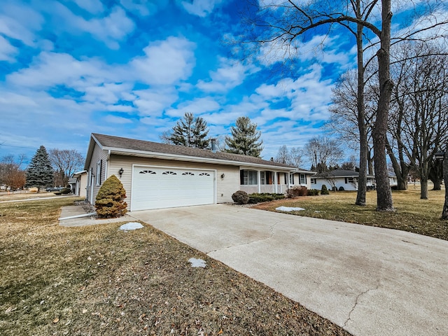 single story home with a garage, driveway, a porch, and a front yard