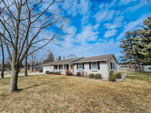 single story home with a garage, a front yard, fence, and driveway