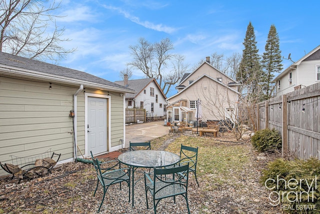 view of yard featuring a patio area and a fenced backyard