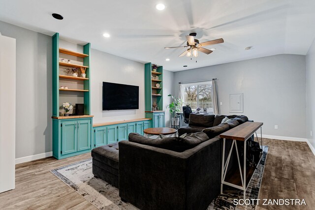 living room with recessed lighting, wood finished floors, a ceiling fan, and baseboards