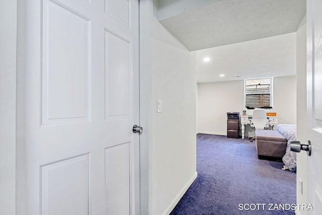 corridor featuring carpet floors, recessed lighting, and baseboards