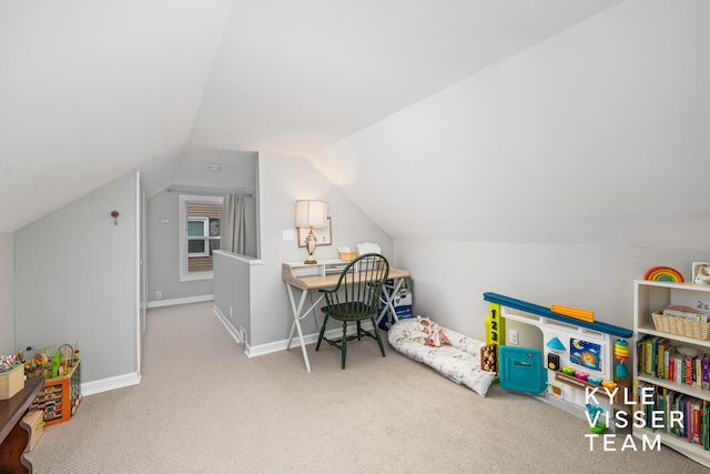 recreation room with carpet floors, baseboards, and vaulted ceiling