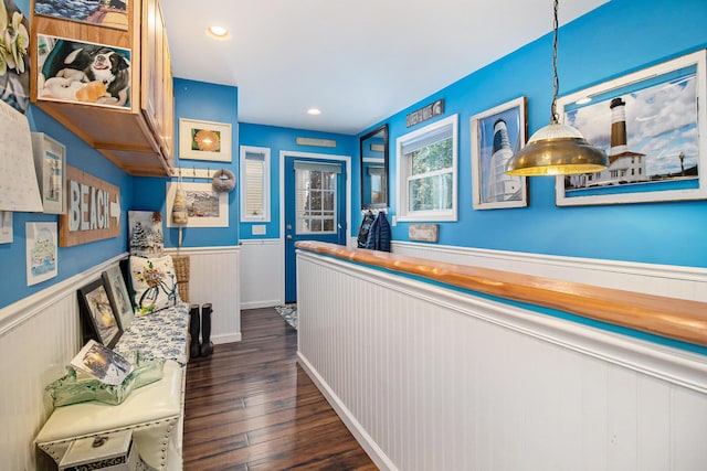 hall with wainscoting, dark wood finished floors, and recessed lighting