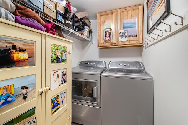 washroom featuring laundry area and washing machine and clothes dryer