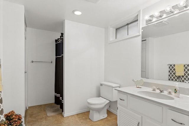 full bath with curtained shower, toilet, vanity, tile patterned flooring, and baseboards