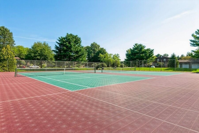 view of sport court featuring community basketball court and fence