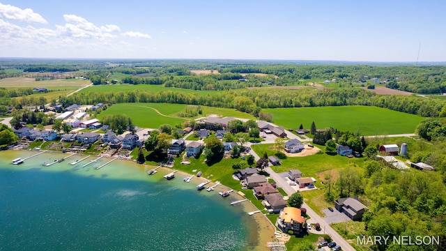 bird's eye view with a residential view and a water view