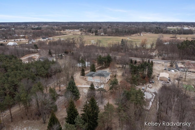 birds eye view of property featuring a rural view