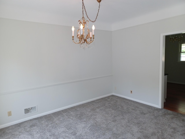 4265 Pine Tree Trl, Bloomfield Hills, MI 48302 - empty room with visible vents, an inviting chandelier, baseboards, and carpet floors