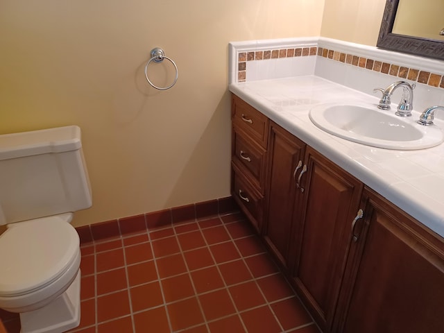4265 Pine Tree Trl, Bloomfield Hills, MI 48302 - bathroom with vanity, decorative backsplash, toilet, and tile patterned flooring