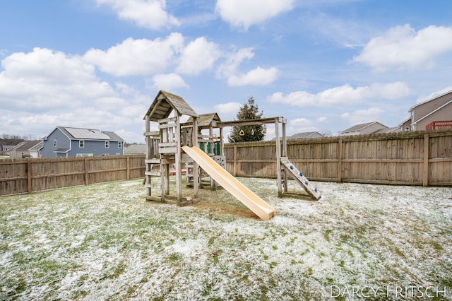 view of play area with a residential view and a fenced backyard