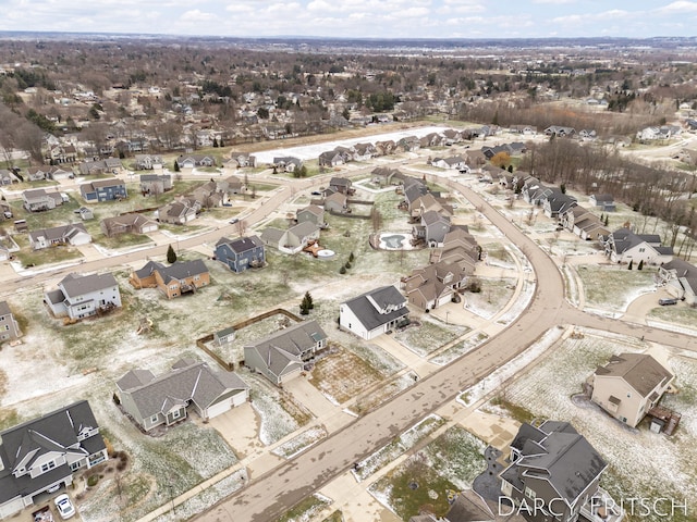 birds eye view of property with a residential view