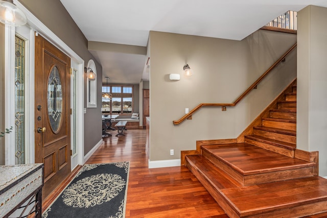 14788 Boom Rd, Spring Lake, MI 49456 - foyer with stairs, baseboards, and wood finished floors