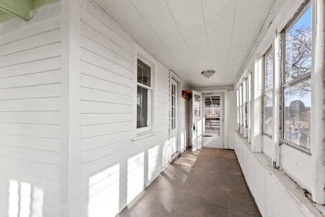 corridor with concrete flooring