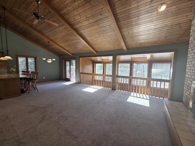 3075 Mineral Springs Trl, Mount Pleasant, MI 48858 - unfurnished living room featuring high vaulted ceiling, a wood ceiling with exposed beams, carpet, a chandelier, and a ceiling fan