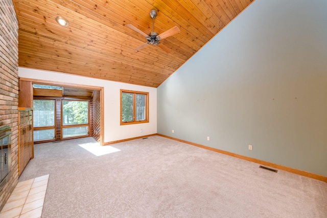 3075 Mineral Springs Trl, Mount Pleasant, MI 48858 - unfurnished living room featuring vaulted ceiling, wood ceiling, light carpet, ceiling fan, and a brick fireplace