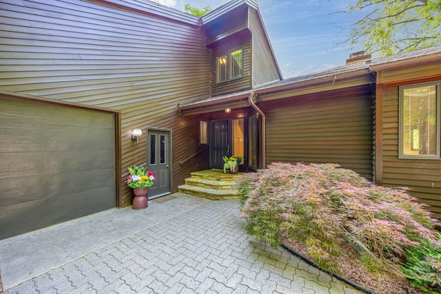 3075 Mineral Springs Trl, Mount Pleasant, MI 48858 - view of exterior entry with a chimney