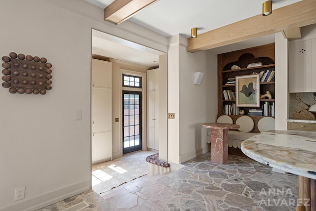 727 Plymouth Rd SE, East Grand Rapids, MI 49506 - foyer entrance with baseboards and beam ceiling